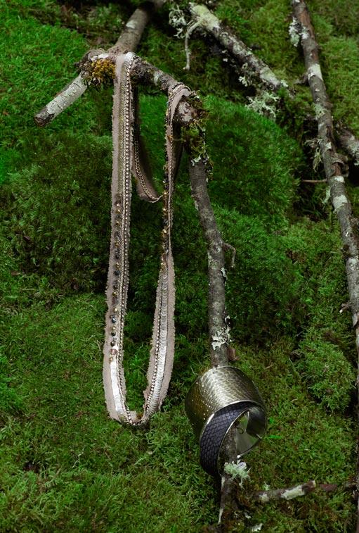 MARIE LAURE CHAMOREL sequin necklace, $230. Wide snakeskin cuff in hunter green, $155. Thin snakeskin cuff in black, $120.